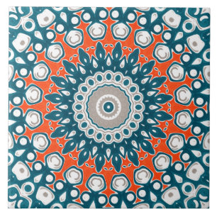 Azulejo Mándala decorativo de azul verdoso y naranja