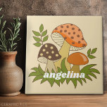 Azulejo Merry Mushroom con nombre personalizado<br><div class="desc">Un diseño divertido con hongos. Un diseño rebotado con tonos aguacate verde,  marrón y naranja.</div>