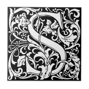 Azulejo negro y blanco de arte nuevo con la letra 