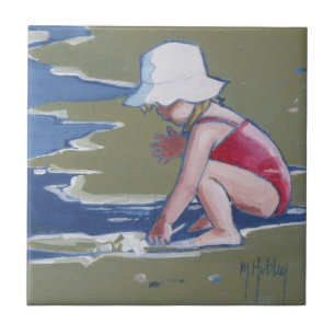 Azulejo Niñita con gorra en la playa con olas