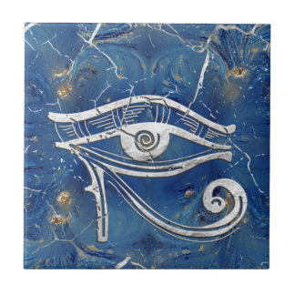 Azulejo Ojo de Horus egipcio de plata sobre mármol azul