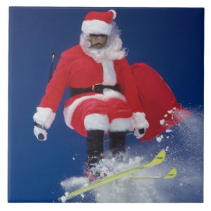 Azulejo Papá Noel en el salto de esquís de una cornisa e
