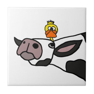 Azulejo Pato divertido en un dibujo animado de la vaca