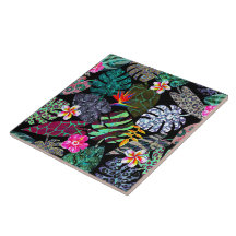 Patrón de hojas y flores tropicales vibrantes