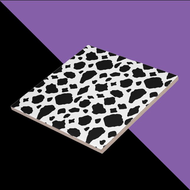 Azulejo Patrón de vaca negro y blanco campestre (A tile with a black and white cow pattern.)