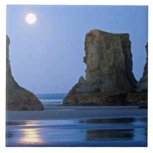 Azulejo Puesta de luna, playa Bandon, Oregon.