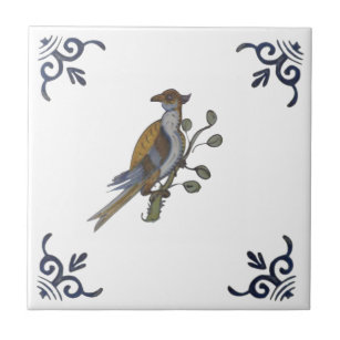 Azulejo Repro Delft Bird en una sucursal con bayas en mosa