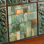 Azulejo Sage Mosaic Artista Cerámica Tile<br><div class="desc">Esta exquisita baldosa cerámica presenta un impresionante collage de cuadrados glaseados, cada uno de los cuales cuenta una historia en tonos de salvia, marea y verde eucalipto. Los acentos de oro ámbar y las motas de arena beige ofrecen un contraste cálido, mientras que la textura crujida aporta un encanto rústico...</div>