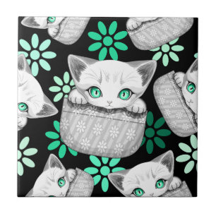 Azulejo Un gato lindo y juguetón al máximo desde un bolsil