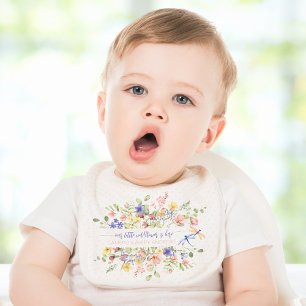 Babero Una flor silvestre está aquí personalizada