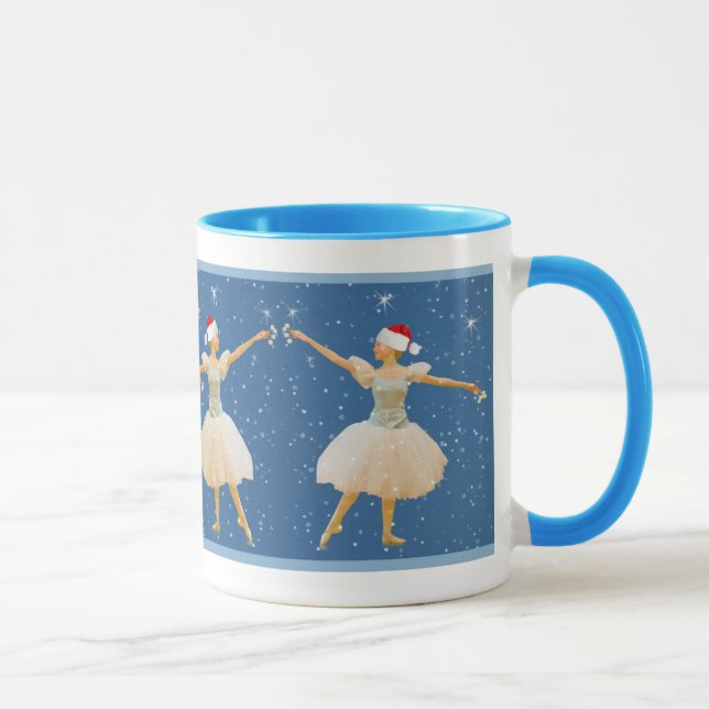 Bailarina del navidad con la taza de las (Derecha)