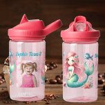 Bajo el mar Mermaid Niños Escuela Botella de Agua<br><div class="desc">"¡Haga un chapuzón con esta encantadora botella de agua bajo la sirena marina, el regalo de cumpleaños perfecto para los niños! Diseñada con colores vivos inspirados en el océano y adornada con sirenas mágicas, esta botella de agua duradera es práctica y divertida a la vez. Personalízalo con una foto personalizado...</div>