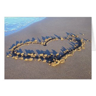 bajo mi paraguas/corazón en la arena