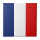 Baldosa cerámica de bandera francesa<br><div class="desc">Este diseño está formado por la bandera francesa,  que se ha reformado inteligentemente para ajustarse a la superficie cuadrada de las baldosas. Un objeto decorativo y útil que sería un regalo perfecto para los que quieran recordar Francia.</div>