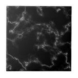 Baldosa efecto mármol negro<br><div class="desc">¿Busca una baldosa que le pueda añadir un toque elegante y sofisticado a su casa? No hay más que ver nuestro mosaico con efecto mármol en blanco y negro clásico. El impresionante efecto de mármol de esta baldosa crea una sensación de lujo atemporal y de moda, mientras que los colores...</div>