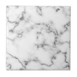 Baldosas de efecto de mármol gris y blanco<br><div class="desc">El embaldosado presenta un diseño refinado de mármol blanco realzado por un suave revestimiento gris. La decoración de mármol natural ofrece detalles sutiles y un aspecto limpio y clásico que realza los espacios modernos y tradicionales. Con un acabado suave y brillante, el azulejo es duradero y fácil de mantener, lo...</div>