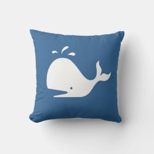ballena de DIBUJO ANIMADO blanca sobre almohada az