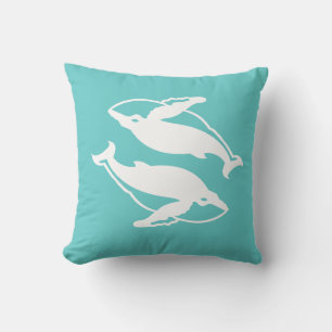 ballenas blancas en almohada azul turquesa