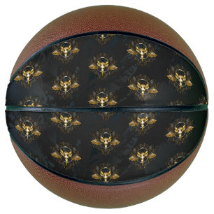Balón De Baloncesto Cráneo de pájaro dorado sobre fondo negro