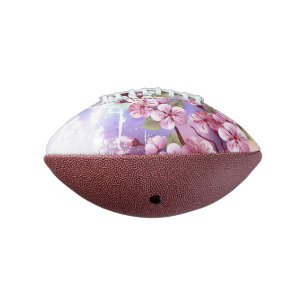 Balón De Fútbol Americano Sakura rosa sobre fondo de pintura