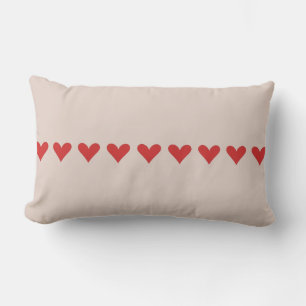 Banda roja y rosa de la almohada lumbar del corazó
