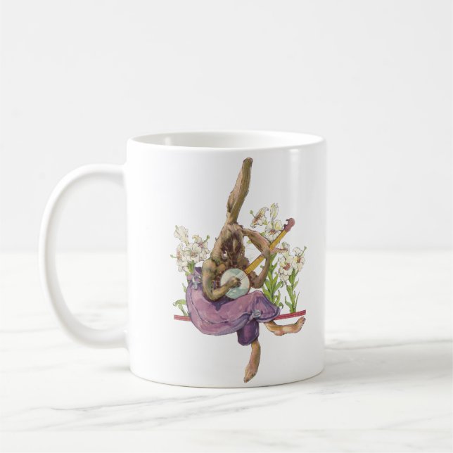 Banjo que juega la taza del conejito (Izquierda)