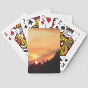 Baraja De Cartas Amanecer de humo sobre las montañas...