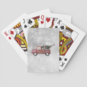 Baraja De Cartas camión vintage rojo sobre un fondo bokeh gris bici