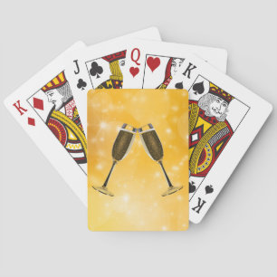 Baraja De Cartas Celebración de gafas de champán sobre oro esparcid