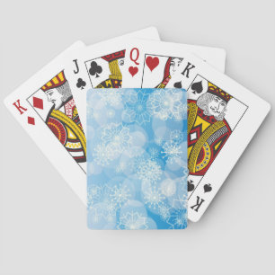 Baraja De Cartas Cochitos de Navidad sobre un fondo azul        