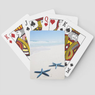 Baraja De Cartas Dos estrellas de mar azules en el borde del agua e
