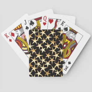 Baraja De Cartas Estrellas doradas sobre un fondo negro