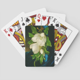 Baraja De Cartas Magnolias gigantes sobre una tela de terciopelo az