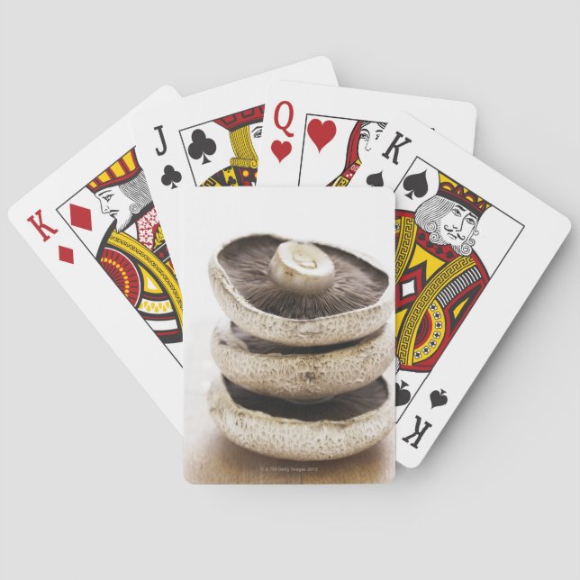 Baraja De Cartas Tres setas planas en pila en el tablero de madera (Reverso)