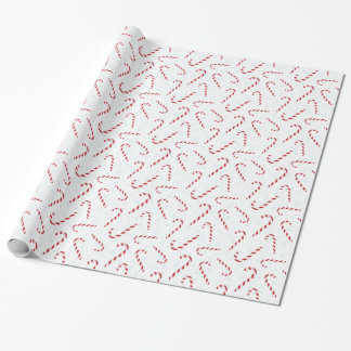 Bastones de caramelo con el papel de embalaje de