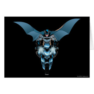 Batman en bicicleta con capa