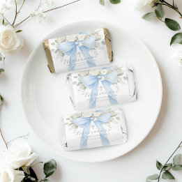 Bautizo de bebé niño con lazo azul floral