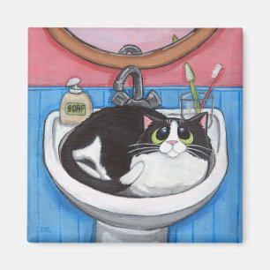 Bebé en el fregadero - imán del gato