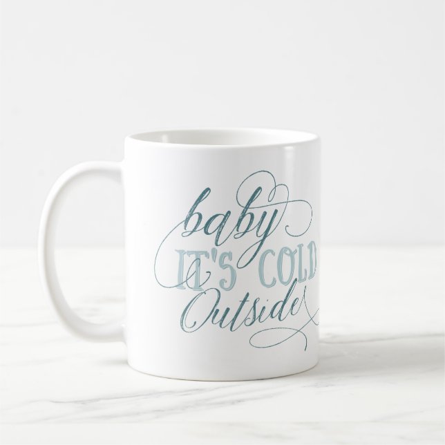 Bebé es taza exterior fría de la cita de la (Izquierda)