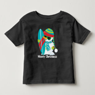 Bebé Navidades Beach surfeando camiseta de un niño pequ