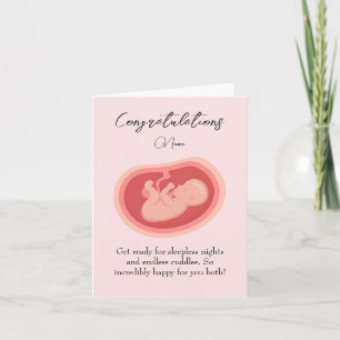 Bebé rosa en la forma de la tarjeta de felicitacio