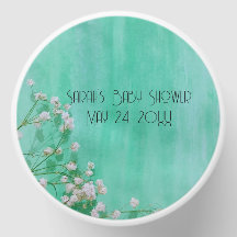 Bebés blancos y verdes en Baby Shower en flor