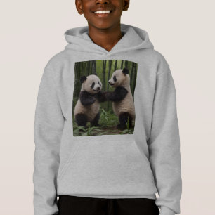 Bebés pandas juguetones en un bosque de bambú,