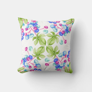 Berries de porcelana en una almohada cuadrada