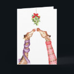 Besos de jirafas bajo tarjeta de Navidades de mist<br><div class="desc">Que alguien se sienta cálido y difuso con estos Navidades con esta linda tarjeta de temporada que incluye dos jirafas besándose bajo la mistletoe,  ambas usando ropa de cama festiva 🦒</div>