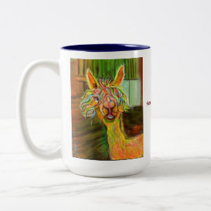 Bicolor Alpaca de Hilda con la taza de la historia