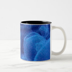 Bicolor Ángeles de la taza de café ligera