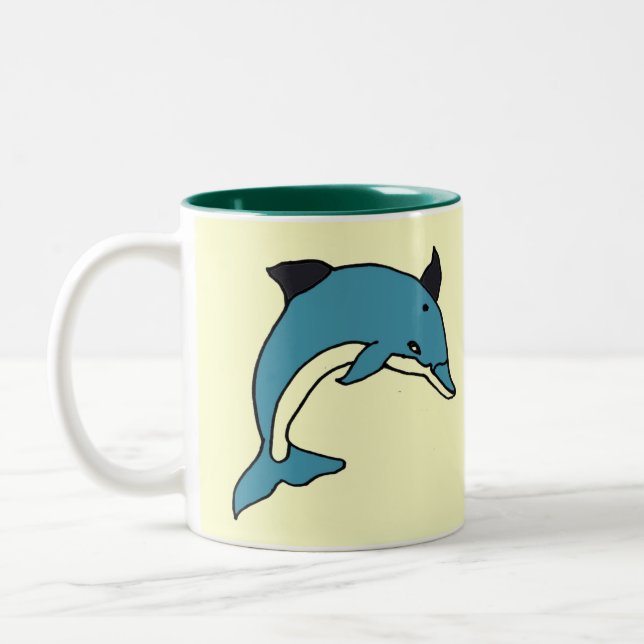 Bicolor CH que salta la taza del delfín (Izquierda)