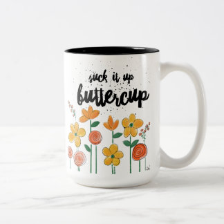 Bicolor Chúpelo encima de la taza del ranúnculo