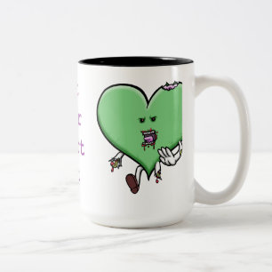 Bicolor Coma su taza del zombi del corazón hacia fuera -